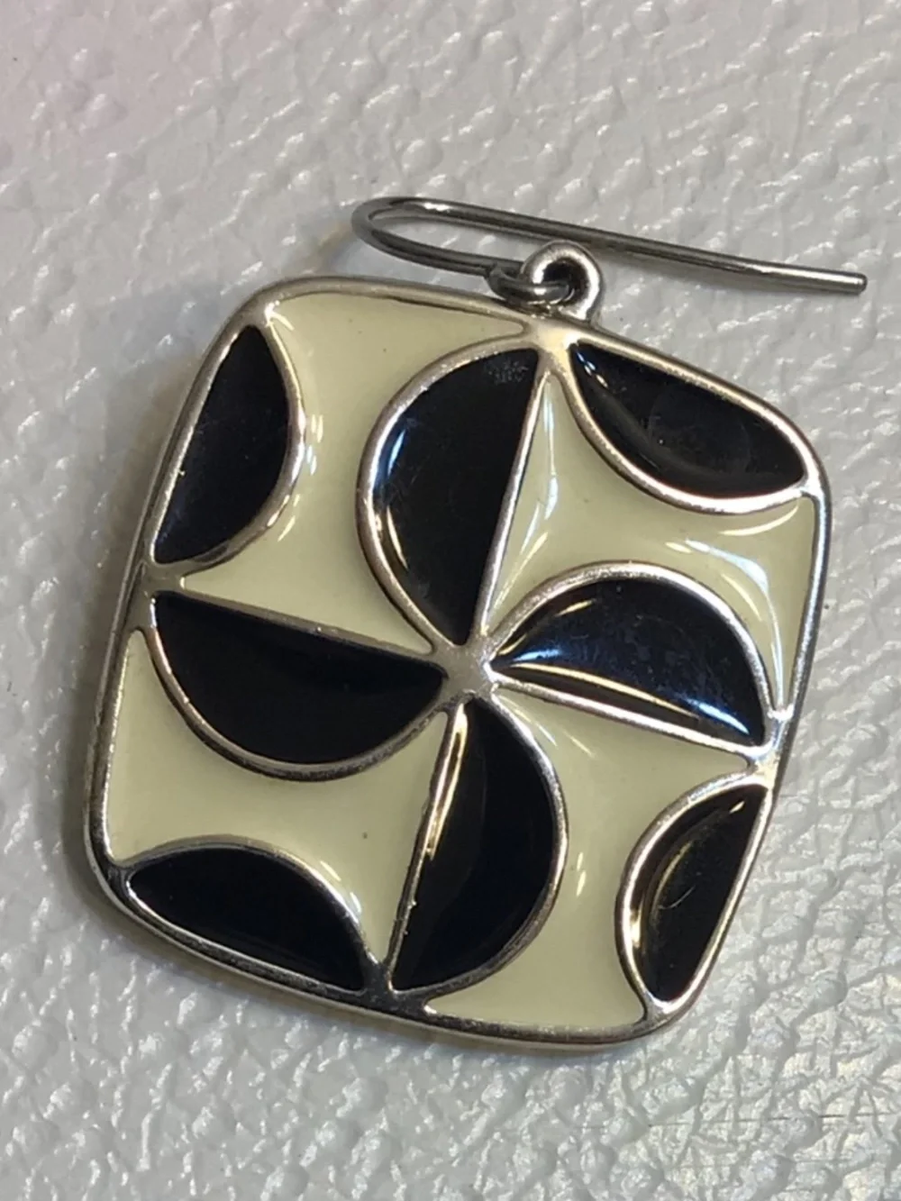 Stylish 1980s Geometric Enamel Hook Earrings with Black and Cream-colored Design